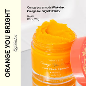 Winky Lux Orange You Bright Exfoliator texture closeup reveals micro-granules and chemical exfoliation