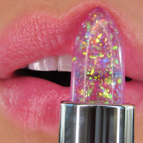 Sheer pink tint visible on lips after application