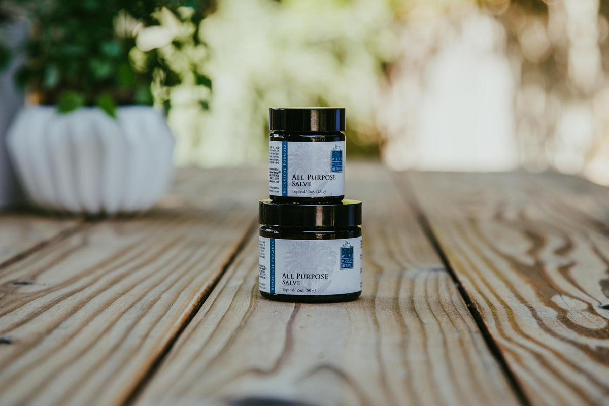 Wise Woman Herbals salve jar texture showing creamy consistency