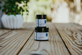 Wise Woman Herbals salve jar texture showing creamy consistency