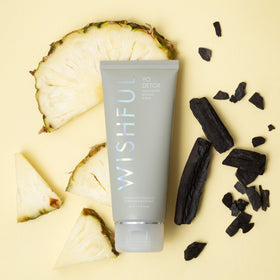 Wishful Yo Detox Charcoal foam dispense illustrates gentle lather and exfoliation