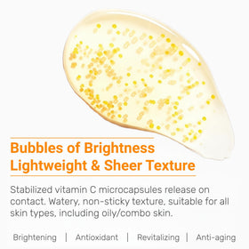 Close-up of WNP serum texture with oil-bead droplets for fast absorption.