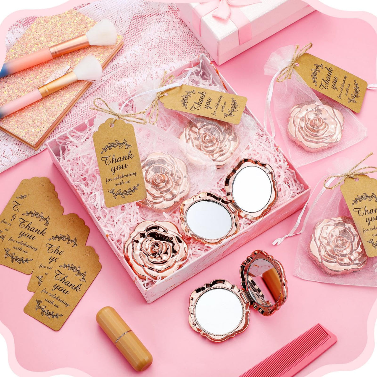 Elegant guest gift idea: Woanger rose compact mirror with matching packaging.