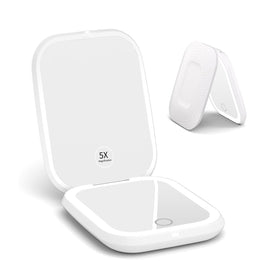 WOBSION rechargeable 5x magnifying travel mirror in use for precise grooming on the go.