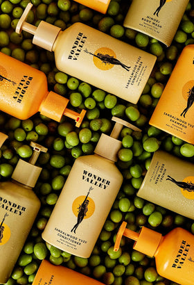 Wonder Valley Sandalwood Yuzu Conditioner bottle emphasizing lightweight, nourishing hydration.