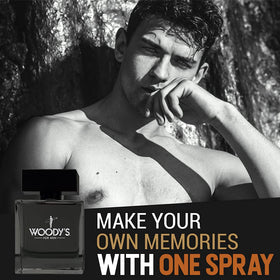 Woody's Cologne label close-up highlights craftsmanship and brand detail.