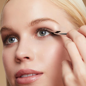 Woosh Arc Brush winged liner precision with the angled end for blending.