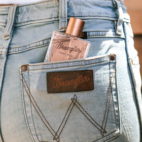 Wrangler Original scent profile graphic illustrates top, middle, and base notes.