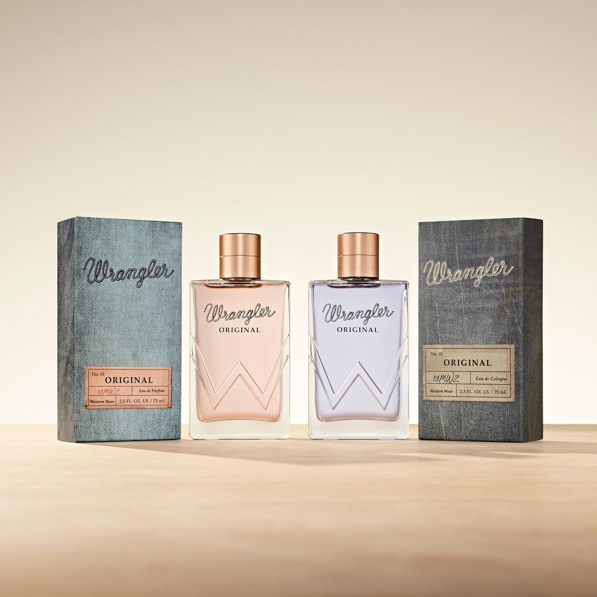 Wrangler Original perfume in hand demonstrates portable fragrance for on-the-go use.