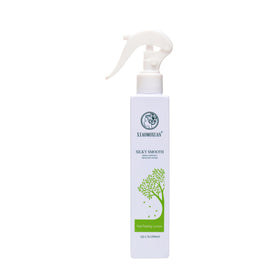 Xiaomoxuan Tea Tree Leave-In Conditioner bottle for deep hydration