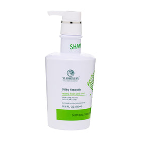 Xiaomoxuan Tea Tree Oil Shampoo bottle, sulfate-free formula for gentle cleansing.