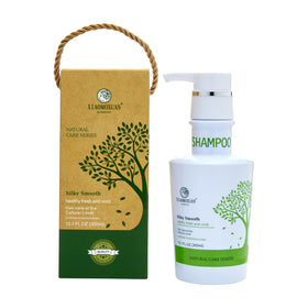 Xiaomoxuan Tea Tree Shampoo label highlights organic ingredients for healthier hair.