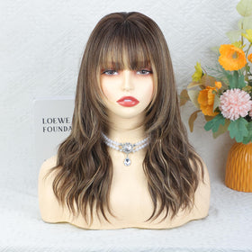XIXIBI ombre wig with bangs features 18 inch layered curls for volume.