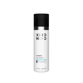 XMONDO Hair Hydrify oil bottle smoothing and adding radiant shine.