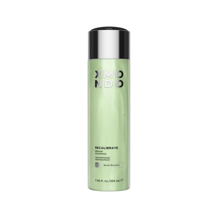 XMONDO Hair Recalibrate bottle front view with vegan bond repair formula.