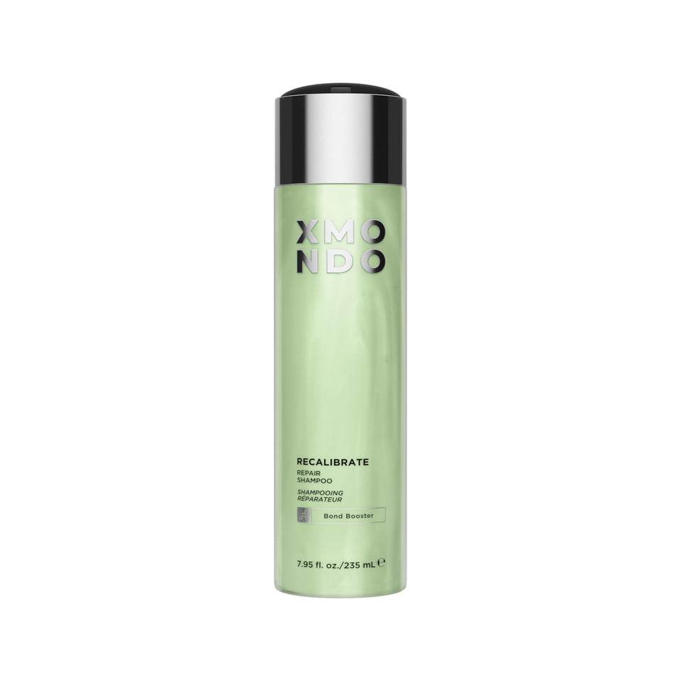 XMONDO Hair Recalibrate bottle front view with vegan bond repair formula.