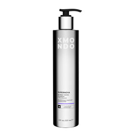 XMONDO Supernova Blonde Toning Shampoo being poured to reveal rich lather for blonde locks.