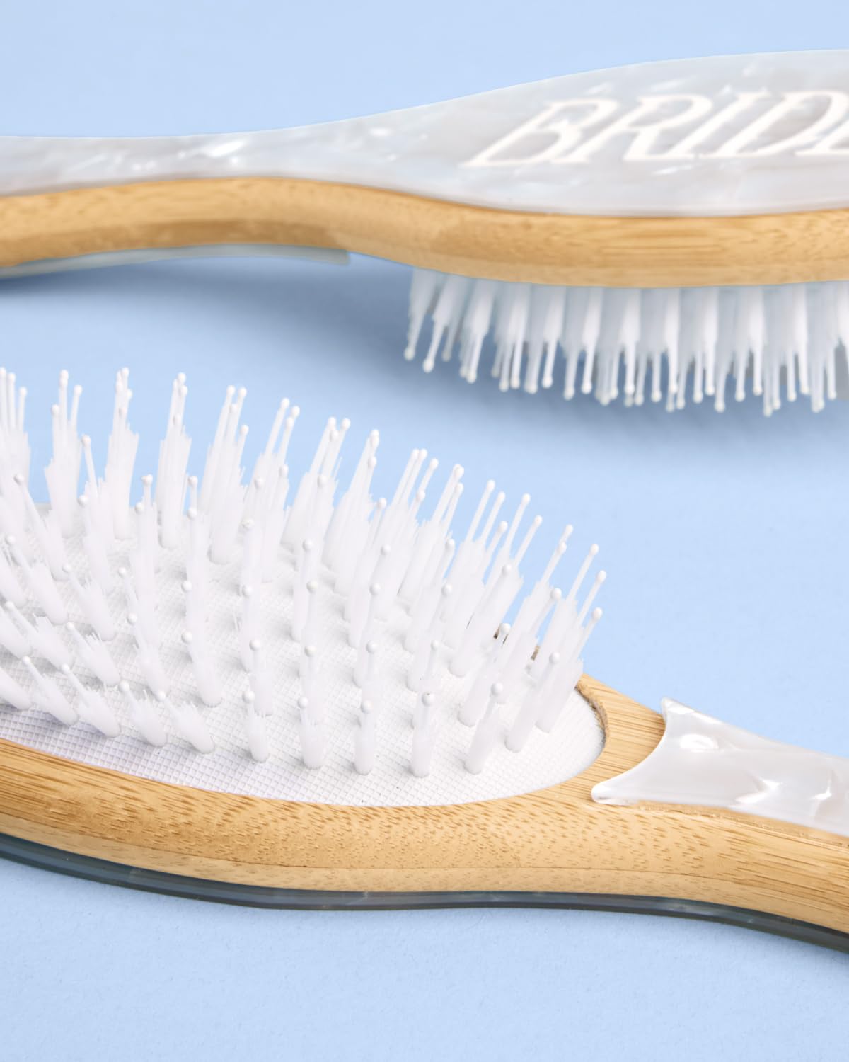 xo, Fetti Bride Hair Brush iridescent back catching light