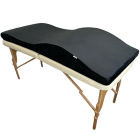 Xolloz Lash Bed Topper memory foam pad delivers plush comfort for long lash sessions.