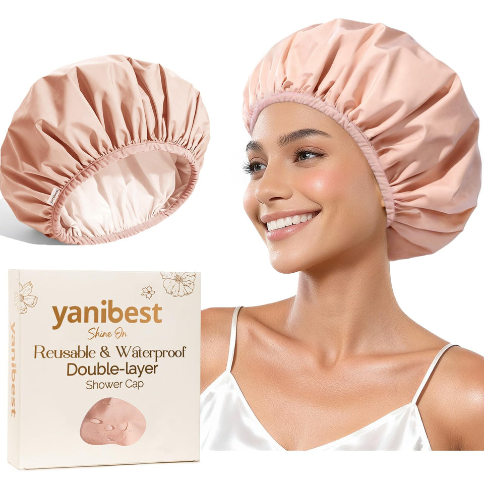 YANIBEST peachy-pink reusable shower cap keeps hair dry during showers.