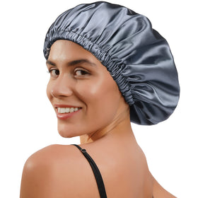 YANIBEST silk bonnet ash blue on bed promoting comfort and hair care during rest