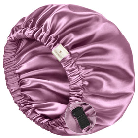 YANIBEST silk sleep cap lavender on head provides comfortable sleep and hair protection.