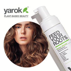 Close-up of root-focused application with Yarok mousse for voluminous hair.
