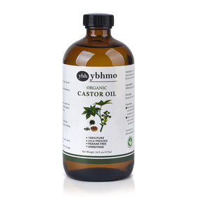 YBHMO castor oil in amber bottle close-up emphasizing purity and packaging