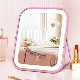 YEKKOPT pink rechargeable vanity mirror with lights for precise makeup application.