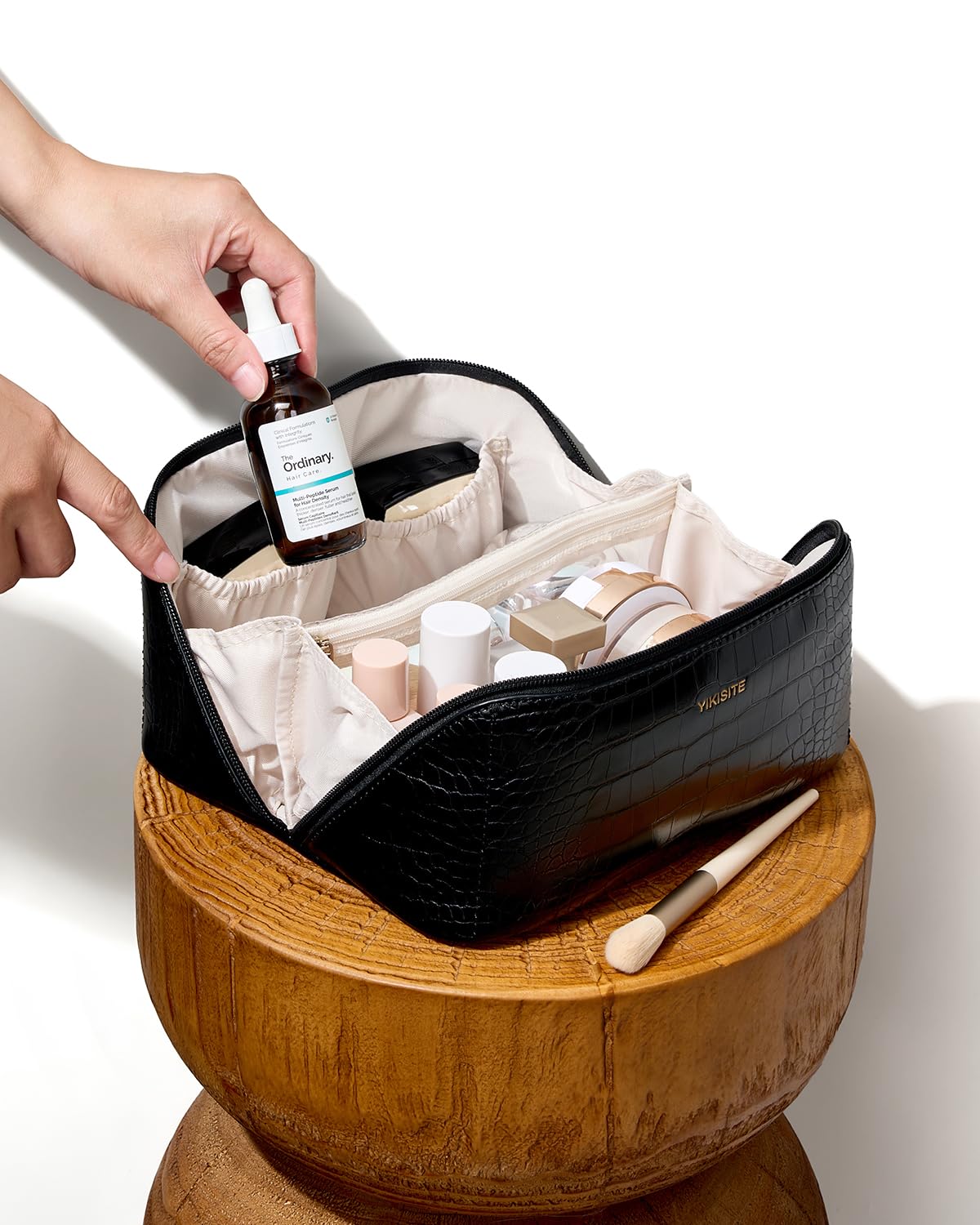 Yikisite daily-use makeup organizer fits on countertops and bags