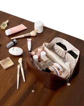 Yikisite makeup bag as toiletry or purse shows versatile use.
