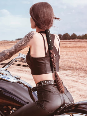 Close-up of Yinkin leather hair wrap showing stainless steel hook for secure closure