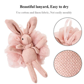 Detail of pink rabbit loofah showing soft mesh texture.