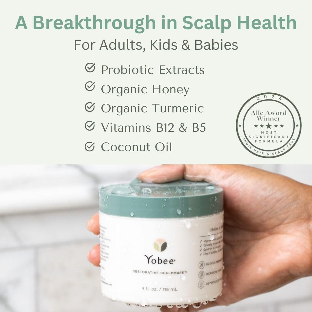 Yobee Restorative Scalp Mask spreads on hand illustrating rich texture for deep conditioning