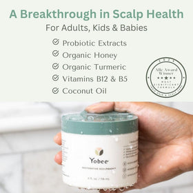 Yobee Restorative Scalp Mask spreads on hand illustrating rich texture for deep conditioning