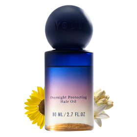 YOLU Hair Oil Frizz Control bottle pour shows easy application and fast absorption