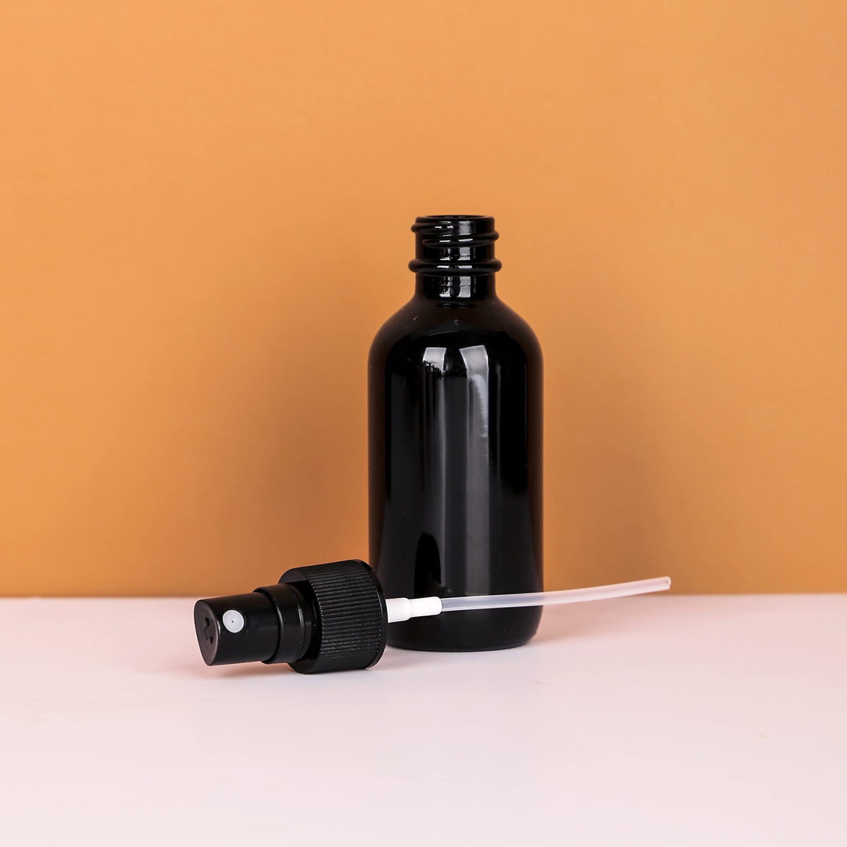 Lightweight, travel-ready bottle fits in cosmetic bags.