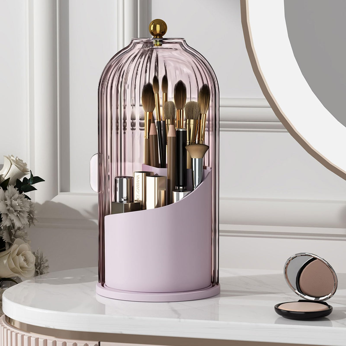 YOOLENS pink makeup brush holder on vanity with clear lid for dust protection.