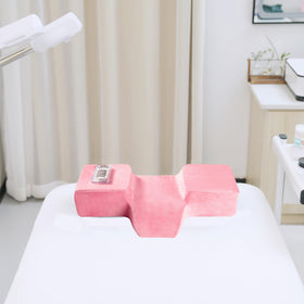 Youlona lash pillow with side pockets keeps tweezers handy