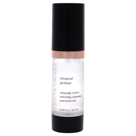 Youngblood Mineral Primer being applied to skin for smoother foundation prep.