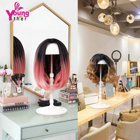 Youngther wig head display holder demonstrating reliable wig presentation.