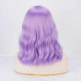 YOUNIGA shoulder-length waves frame the face for versatile styling.