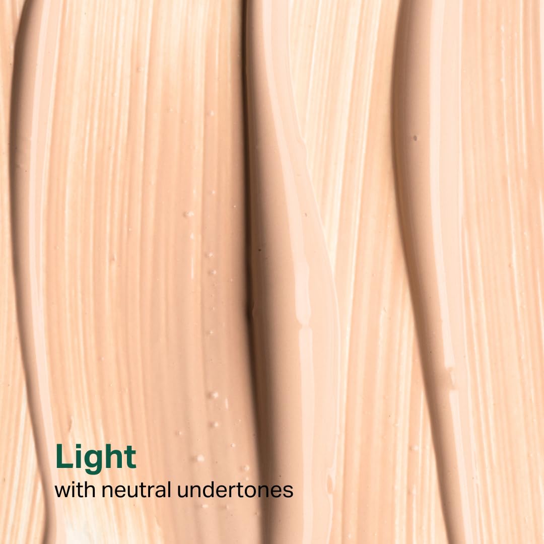 Model swatch of Y'OUR Tinted Moisturizer SPF 30 showing even tone and glow