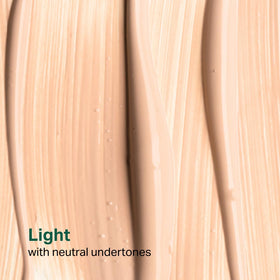 Model swatch of Y'OUR Tinted Moisturizer SPF 30 showing even tone and glow