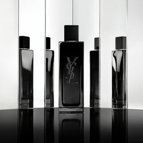 YSL MYSLF bottle with cap removed, illustrating the refill feature.