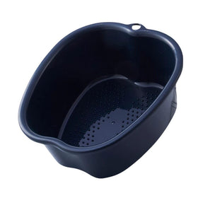 Ytterbium foot soaking tub with massage nodes eases foot tension after work.