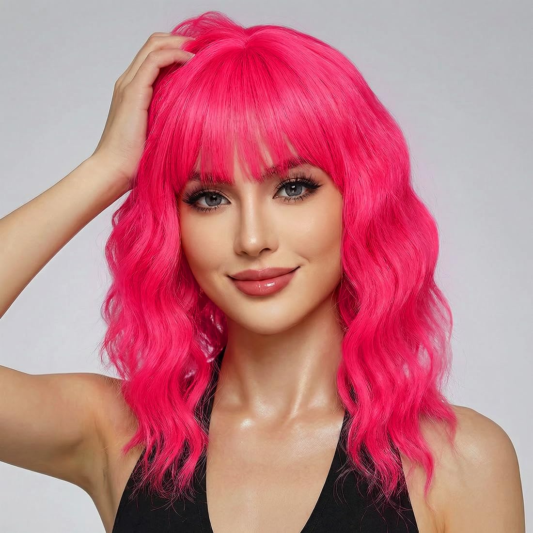 yumtaro pastel hot pink wavy bob wig front view for natural volume and cosplay appeal