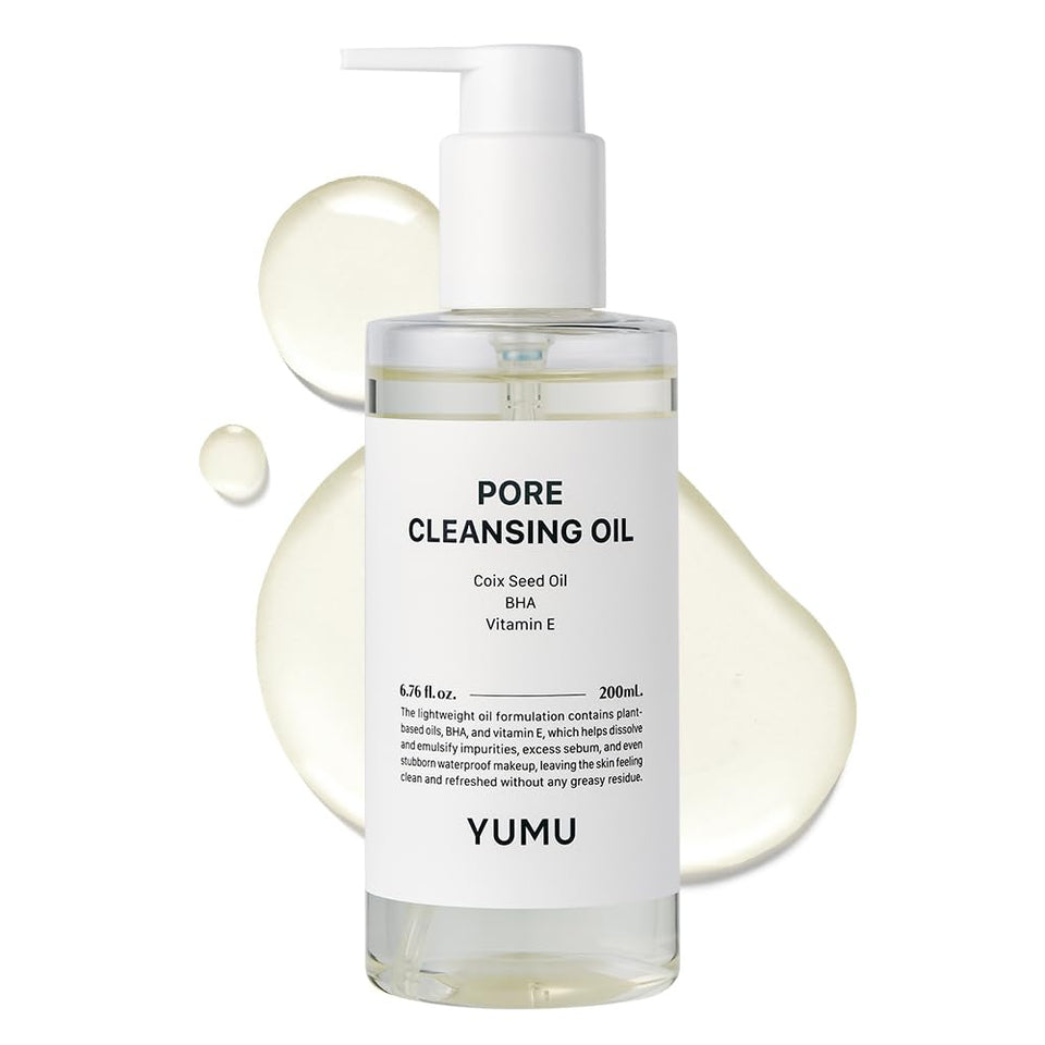YUMU Coix Seed Deep Pore Cleansing Oil bottle pour for easy makeup removal.