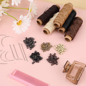 Yuxung kit in use highlighting bead threading and thread tension