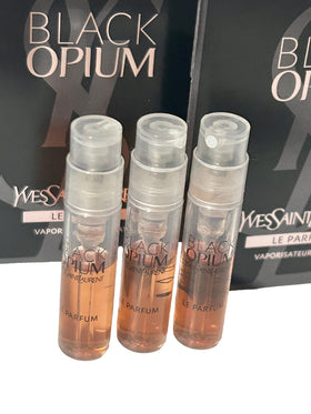 YSL Black Opium LE PARFUM vials closeup showing miniatures.